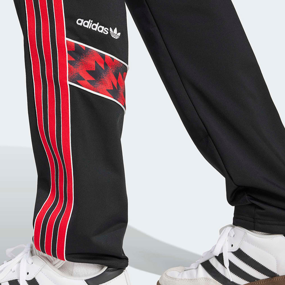 
                  
                    ADIDAS MUFC TT 91
                  
                