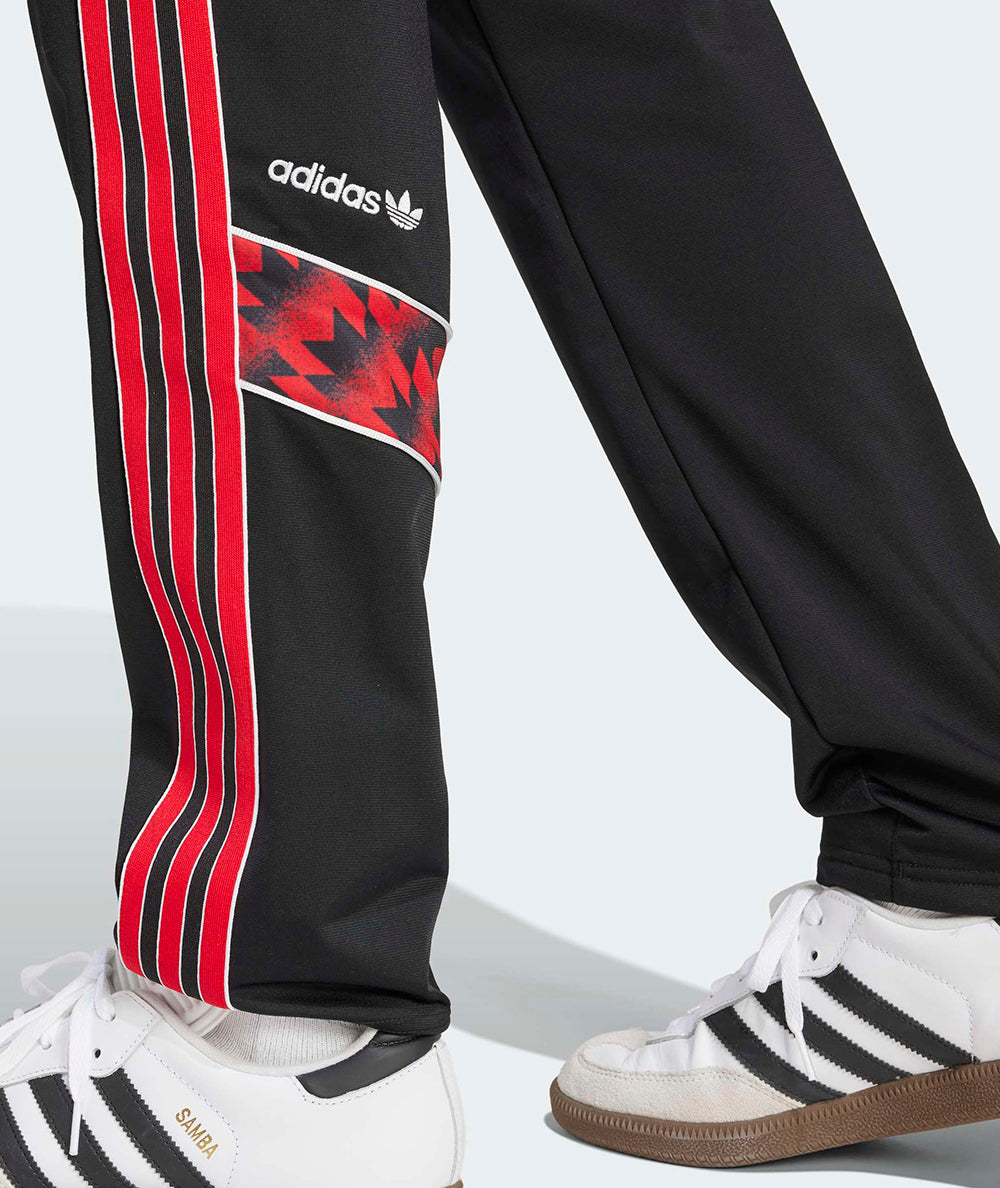 
                  
                    ADIDAS MUFC TT 91
                  
                