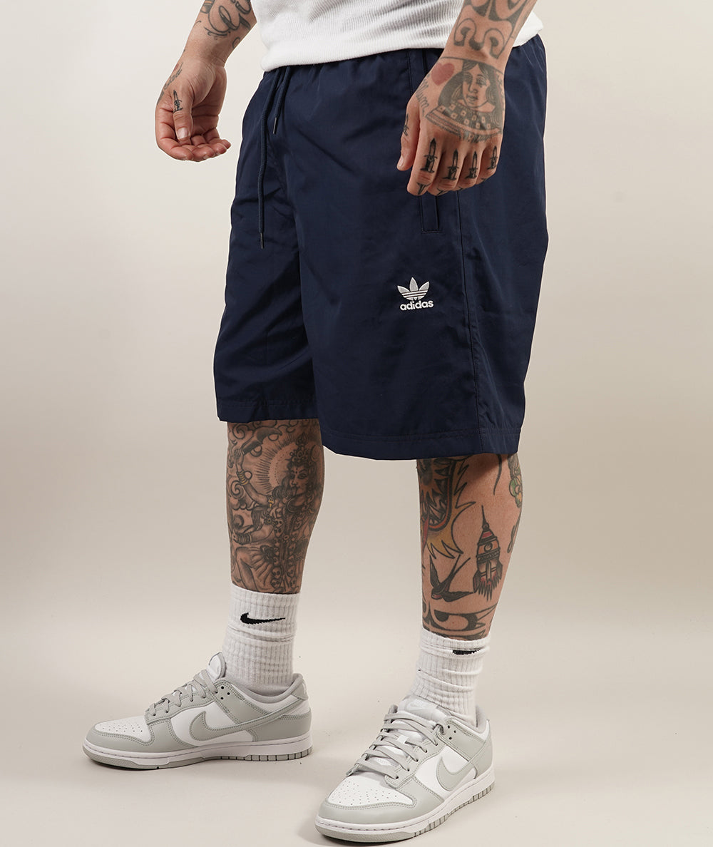 
                  
                    ADIDAS TRACE WOVEN
                  
                