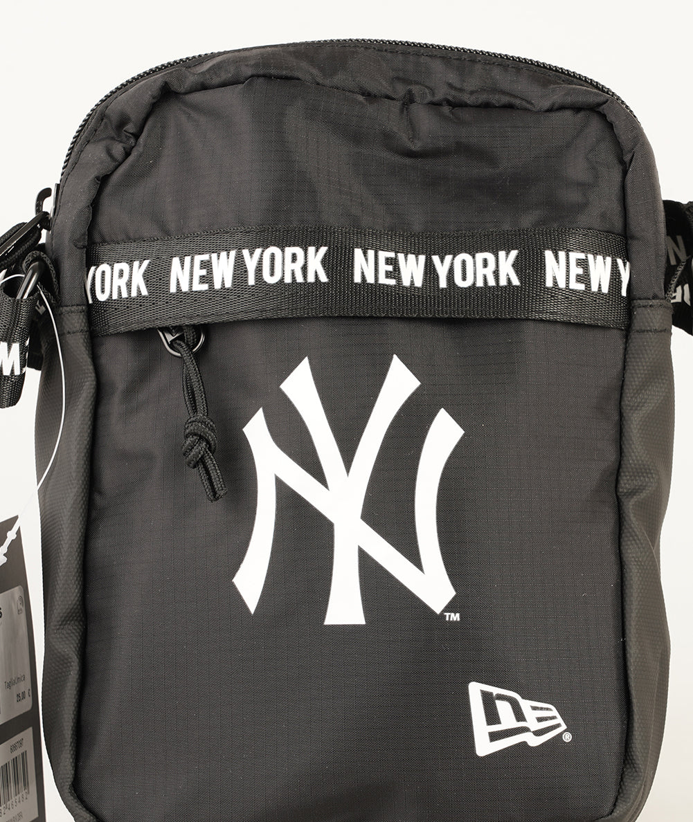
                  
                    NEW ERA NY STRAP SIDE
                  
                