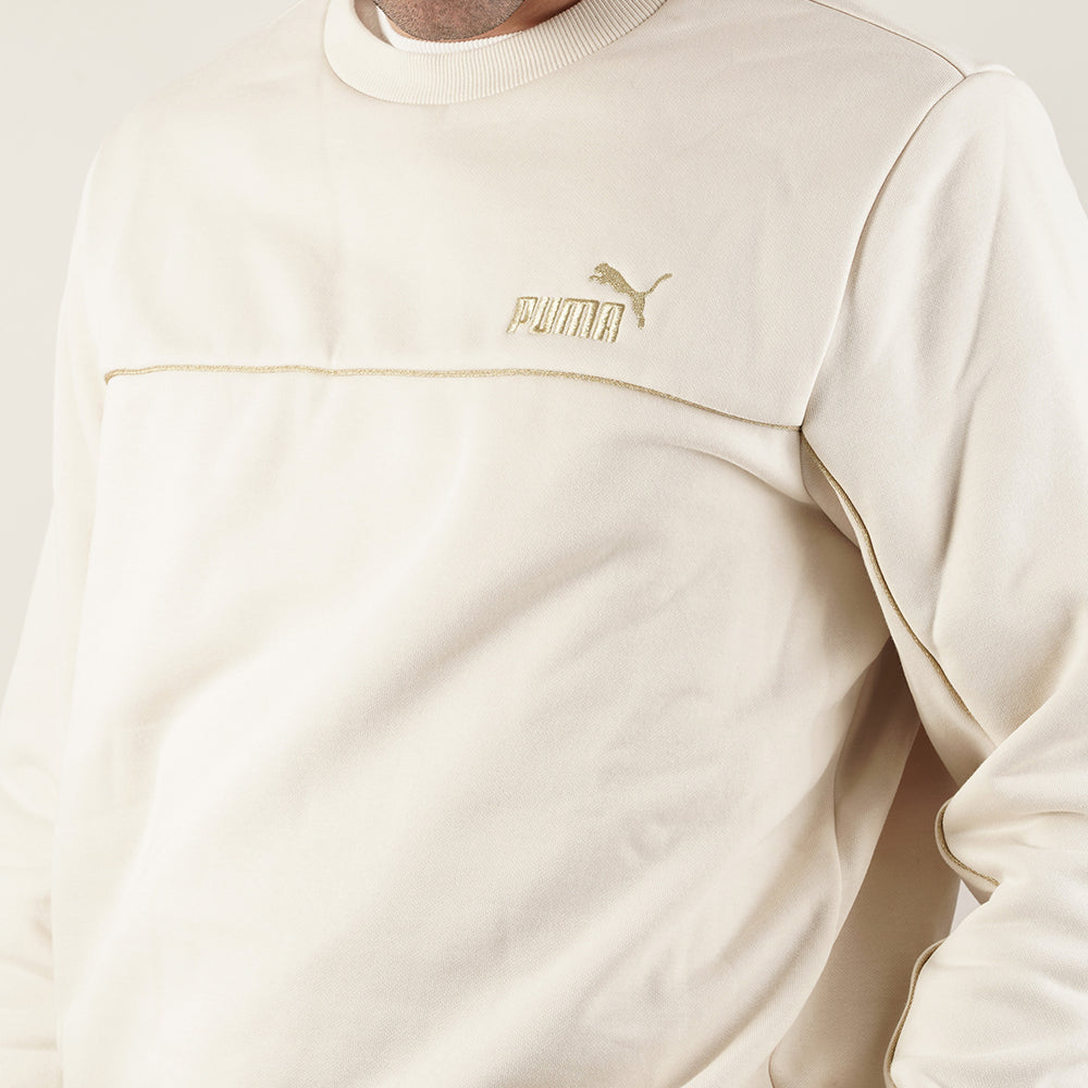 
                  
                    PUMA ESS+ MINIMAL GOLD
                  
                