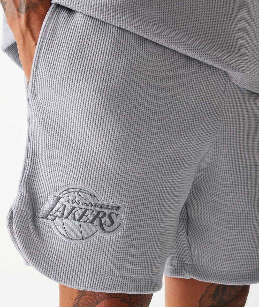 
                  
                    NEW ERA SHORT LOS ANGELES LAKERS
                  
                