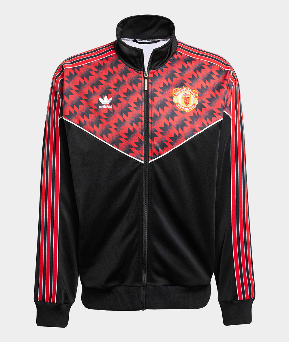 
                  
                    ADIDAS MUFC TT 91
                  
                